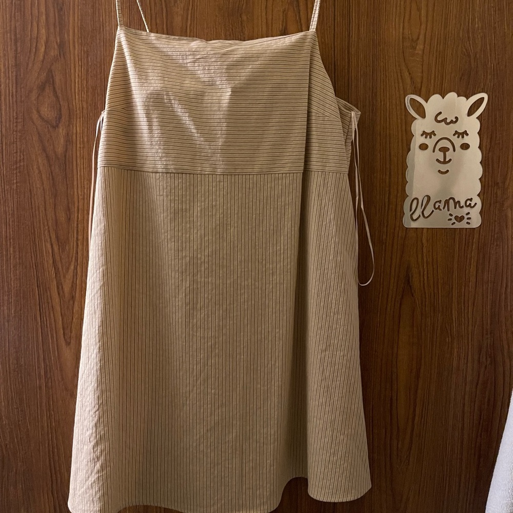 short Zara nightly. Tan color with strips. Fresh out the box. Never worn perfect